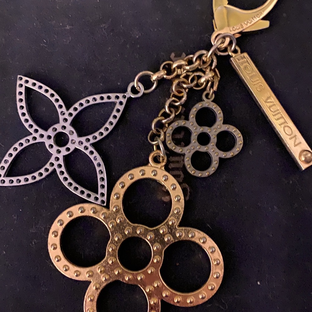 LV gold/bronze bag charm-reposhing
